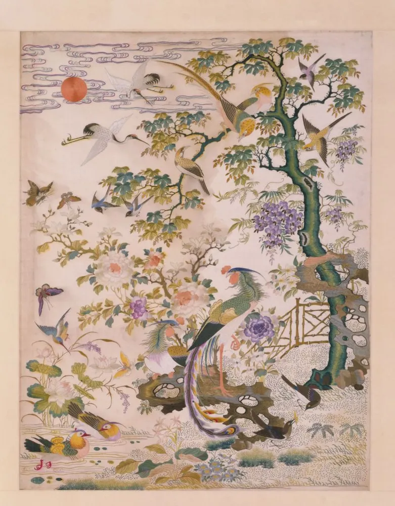 Qing Dynasty Cantonese embroidery mounted piece titled Phoenix Facing the Sun, depicting a phoenix perched on a rock under a wutong tree facing the rising sun, from the Palace Museum collection.