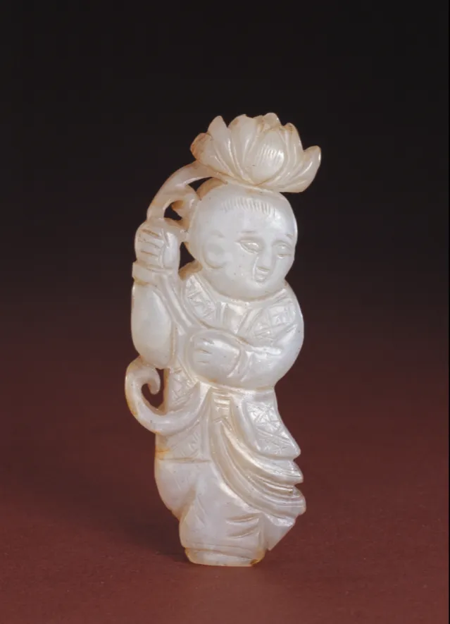 Song Dynasty jade carving of a boy holding a lotus blossom, traditional Chinese auspicious jade pendant